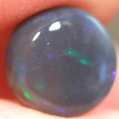 SOLID BLACK CRYSTAL OPAL Rich purple and green